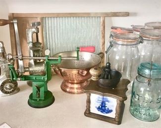 Vintage apple peeler, meat grinder, copper strainer, coffee grinder, many canning jars