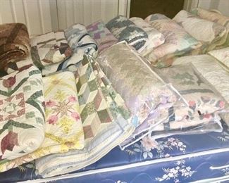 Hand stitched & machine sewn quilts