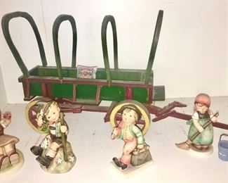 Hummel figurines, vintage wooden covered wagon trailer