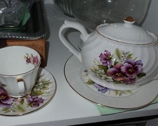 TEA CUP AND TEA POT