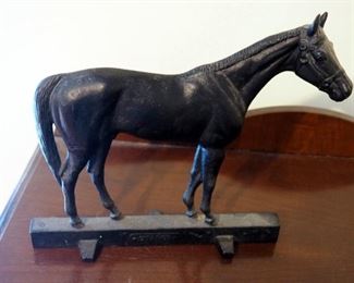 Antique Cast Iron Door Stop Of "Citation", 10" x 11"