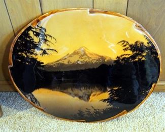 Framed Art Work Assortment Including Lighthouse, Carved Wood Tapestry, And Shellacked Board