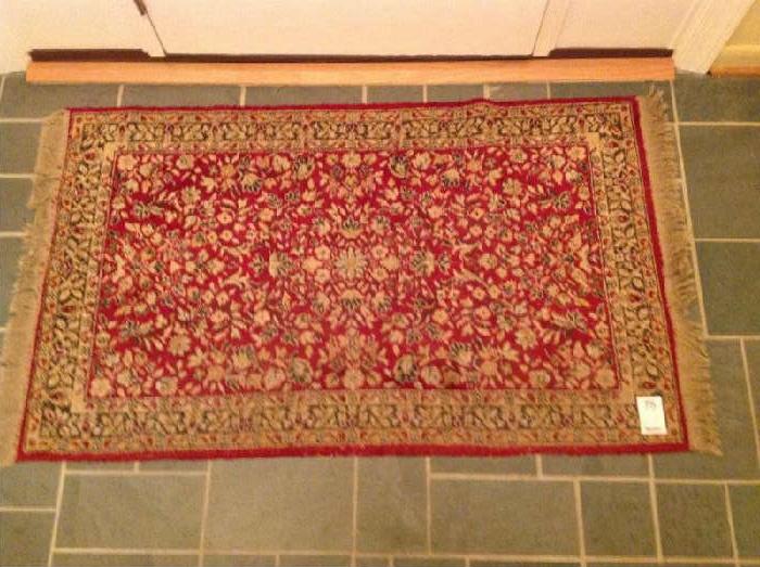 Lot 75
Machine Made. Persian Style Rug

Red background, greenish gray and tan pattern. 61X34 including fringe
