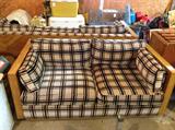 Lot 70
Black And Brown On Beige Background Plaid LoveSeat  

60X25X34. Quarter panel wood sides and back. Matches Lot 68. Includes brown throw pillow. Loveseat very heavy, very good condition.