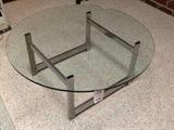 Lot 28
Glass Coffee Table on Metal Base

Round glass top coffee table. Diameter 36 inches round, 141/4 inches height