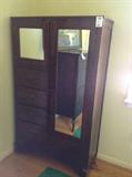 Lot 18
Half Wardrobe

37x62x15 1/2 wxhxd mirrored wardrobe has key lock, one mirror drawer opens with key, 4 drawers, cherry wood look, minor scratches, good condition. Note: Varnish slightly bubbled.Keys included but magnetic catches installed.