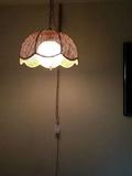 Lot 20
Hanging Lamp

Hanging lamp, beige, tan wicker style, good condition