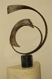 Metal Spiral Sculpture 

http://auctionnearyou.maxsold.com/view-auctions/catalog/id/279/lot/29966/?url=%2Fview-auctions%2Fcatalog%2Fid%2F279%2F%3Fpage%3D1%26items%3D100