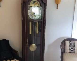 PRICE:  $400.00  Colonial Grandfather clock Serial#7919189 Does not chime, needs repair
Measures: 64"tall  22.5"wide  17"deep 
Item#25417