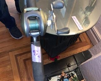 PLL #132
Fishing Poles / Red Rod @ $10 / Bass Pro Shop Rod & Reel @ $25