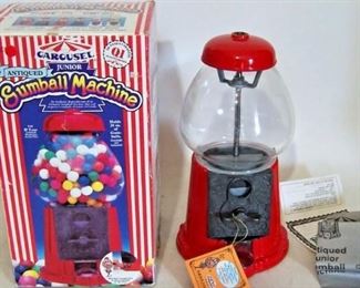 $30 Vintage Red Cherry Carousel Gum ball Machine with Metal w/glass Globe instructions and Box measures about 11 inches tall and the glass globe around 6 inches in diameter. The key is missing but it looks like it was never used. The top screws off easily without the need for key