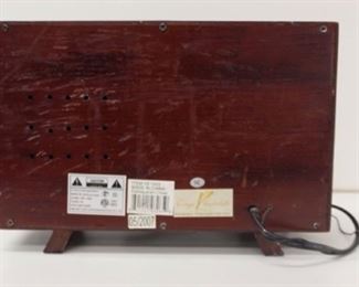 Description: VINTAGE VERANDAH STYLE OF ANTIQUE RADIO #HE1003 120V 60Hz POWER 7W
Size/Dimensions: 11 1/2" X 8" X 4 1/2"
Maker/Model: VINTAGE VERANDAH $60