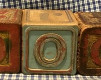 Original set of old wooden Troy ABC blocks that spell out DOG and has illustrations of animals. Also included is an antique RCA Nipper dog figurine and early 1900s photo real snapshot of a man and his dog.