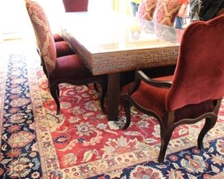 Indonesian heavily carved door made into a dining table
	Measures 106”l x 4’w x 30 ½” h – top & base can be 	separated for ease of moving. It also can be a door 	again if preferred.
