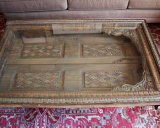 Carved Balinese door cocktail table