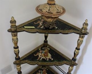 Small corner shelf unit painted with elephant motif