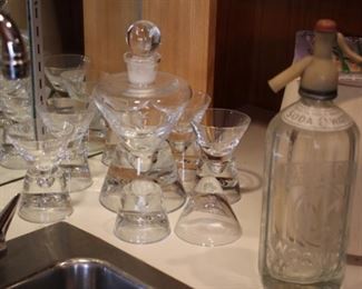 Glass sculptural decanter set
