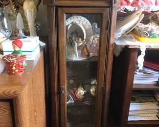 Small lighted curio cabinet