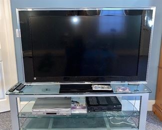 Television: $125                                                                               
Glass Media Stand: $175