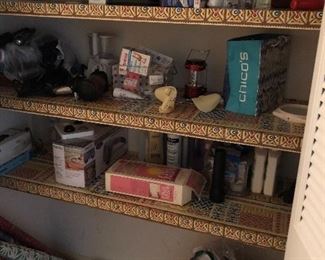 Closet full of personal care items......... possibly even a bottle of hand sanitizer 