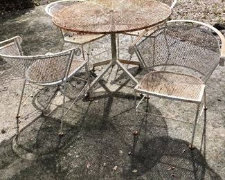 Mid Century Wrought iron patio table and chairs