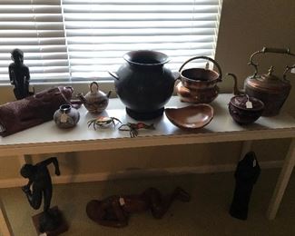 Tribal copper pits and Indonesian pottery