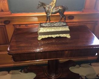 Bronze jockey and Horse and Victorian game table
