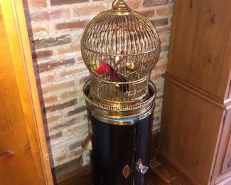  Brass birdcages And a pair of metal warmers