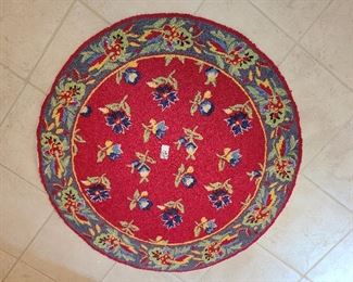 Lot #233 - Small Round Rug - $20