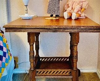 Awesome oak side table & Antique dolls. 