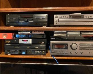all the electronics. surrond sound, VCR's, DVD, Blu-Ray, VCR -DVD recorder, and more