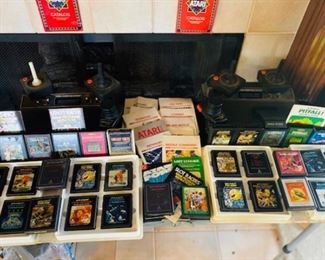 WELCOME TO THE 80'S YALL! 2 ATARI CONSOLES! THE ‘OG’ IN GAMING! OVER 30 GAMES, 4 JOYSTICKS, 2 PADDLE CONTROLS, EVERY OWNERS MANUAL, EVERY CORD & CONNECTION... WORKS PREFECTLY!