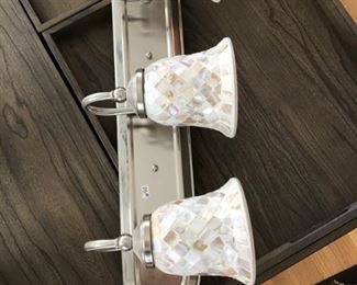 Up to date light fixture. 25.00