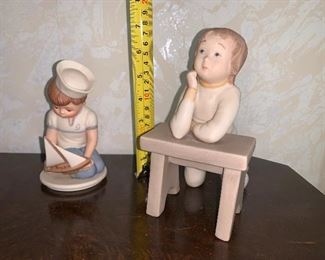 Photo Inv #381 & #382 - Figurine - $10 (Boy with Boat) & Child at a desk ($20)