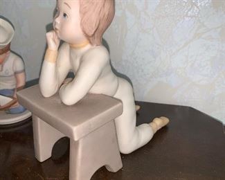 Photo Inv #382 - Figurine - $10 (Boy with Boat) & Child at a desk ($20)