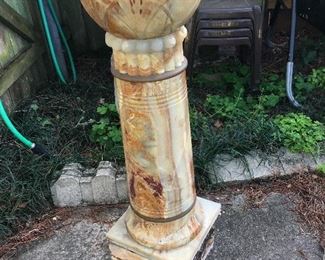 Art Deco Carved Onyx Pedestal , early 20th c., in red, brown, green and cream onyx, reeded column with carved capital, h. 37 1/2 in., molded plinth base, base 12 1/2 in. square   $285