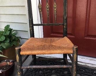 Small, antique painted country spindle back chair with rush seat.    $50
