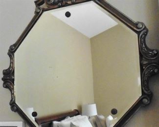 Beveled mirror with Art Nouveau frame. 