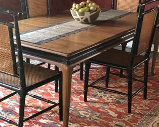 Solid Walnut Dining Table made by Davis Cabinet Company circa 1950  (42"x60") with two leaves is 92".  
Chairs pictured are SOLD.                                               $450                                                                   