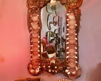 large shell and feather mirror. natural art for your wall