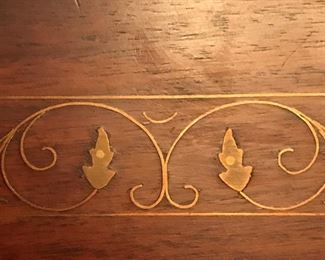 brass inlay on Mid Century wood tea/bar cart