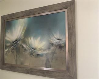. . . a nice piece of floral art in barn wood frame.