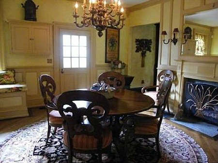 The breakfast room has a nice selection of English and French antiques. The c1840 English Regency table is 60" siam. and has an extra leaf. The chairs are a set of Drexel Lynx armchairs. There is an 18thC English oak doughboy, a French Morbier clock ( not pictured here) and a French provencal cupboard ( not pictured here)