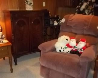 Brunswick vintage phonograph cabinet and lazyboy chair in clean  full finished basement