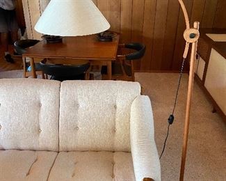 Danish Modern wood arc floor lamp and Domino Mobley sofa, Denmark