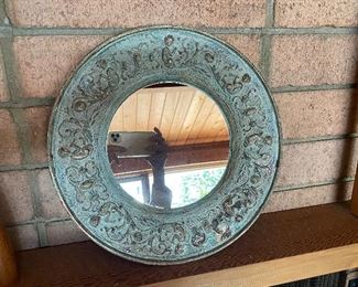 Tin framed round mirror