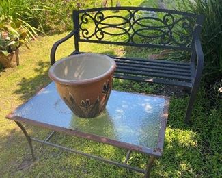 Iron bench and glass top coffee table