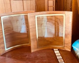 Mid Century Modern bowed/curved picture frames  which hold an 8 x 10. - very unusual! 