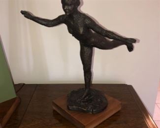 signed bronze statue