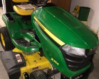 John Deer riding mower, 33 hours, purchased March 2018, 42” mowing deck.  There is also available a lawn mower trailer, drive on hydraulic lift and pull behind sweeper bagger.  